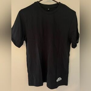 This Designer T shirt Men’s small NWOT